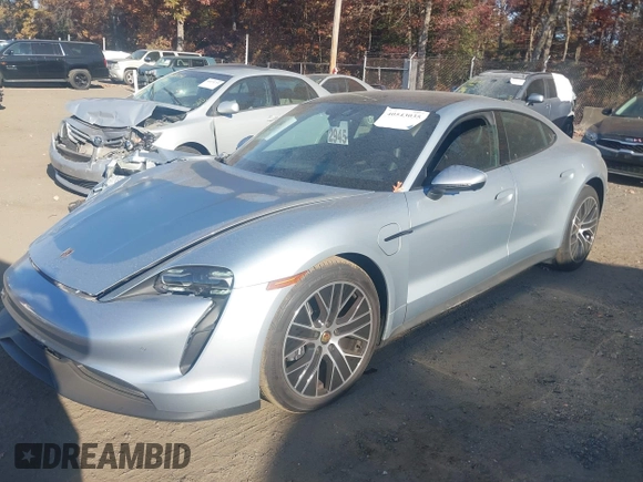 2024 Porsche Taycan with VIN WP0AA2Y13RSA13498, listed as a IAAI auction lot 40543035 with 1,618 mi miles and . Bid and sale history available at DreamBid. Image 2.
