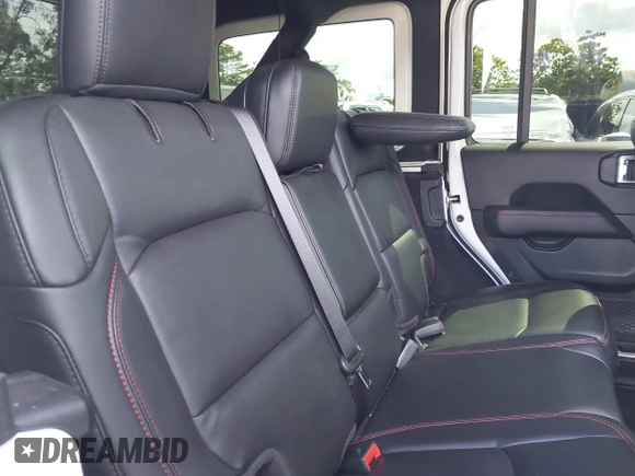 2022 Jeep Wrangler Unlimited Rubicon with VIN 1C4HJXFG8NW130156, listed as a IAAI auction lot 42004630 with 129,313 mi miles and . Bid and sale history available at DreamBid. Image 8.