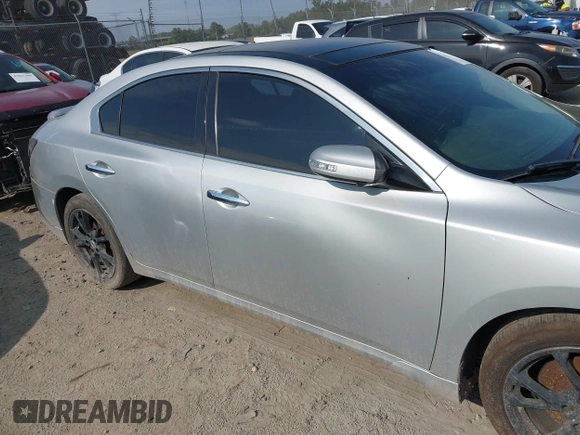 2014 Nissan Maxima S z VIN 1N4AA5AP6EC910967, wystawiony jako IAAI lot #42124722 z przebiegiem 111 986 mil mil oraz . Historia ofert i sprzedaży dostępna na DreamBid. Obrazek 13.