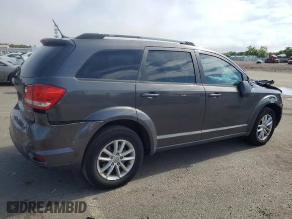 2017 Dodge Journey SXT with VIN 3C4PDDBG7HT592595, listed as a Copart auction lot 60960865 with 116,219 mi miles and Salvage title. Bid and sale history available at DreamBid. Image 3.