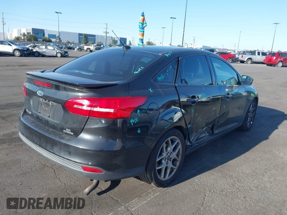 2015 Ford Focus SE with VIN 1FADP3F22FL306055, listed as a IAAI auction lot 41966475 with 139,228 mi miles. Bid and sale history available at carsss.com. Image 4.