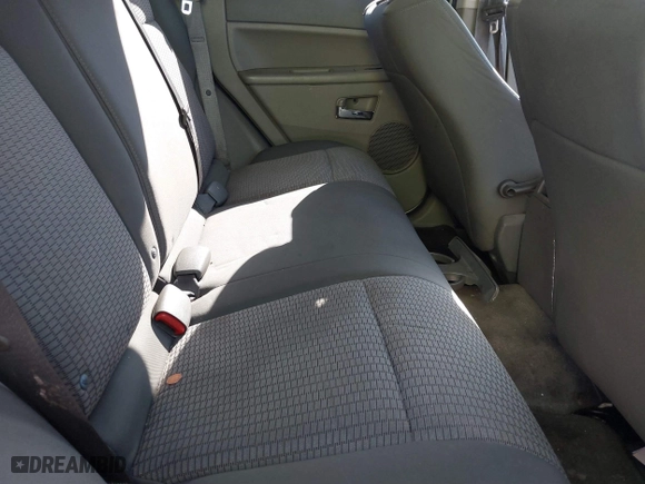 2009 Jeep Grand Cherokee Laredo with VIN 1J8GS48K89C508808, listed as a IAAI auction lot 41821130 with 266,712 mi miles. Bid and sale history available at carsss.com. Image 8.