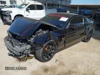 2014 Ford Mustang GT with VIN 1ZVBP8CF6E5309367, listed as a IAAI auction lot 42013913 with 147,786 mi miles and . Bid and sale history available at DreamBid. Image 2.