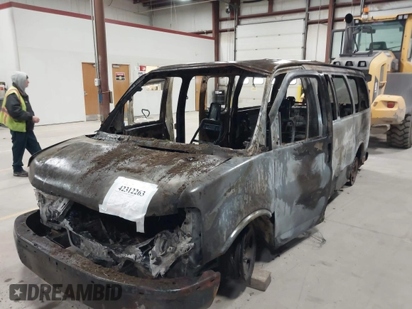 2005 Chevrolet Express Passenger with VIN 1GNFG15T751202874, listed as a IAAI auction lot 42312263 with Not provided miles and . Bid and sale history available at DreamBid. Image 6.