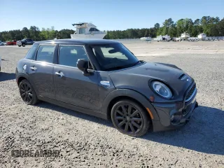 2020 MINI Hardtop 4 Door Cooper S z VIN WMWXU9C02L2M29164, wystawiony jako Copart lot #53538275 z przebiegiem 60 076 mil mil oraz Szkody całkowita. Historia ofert i sprzedaży dostępna na DreamBid. Obrazek 4.