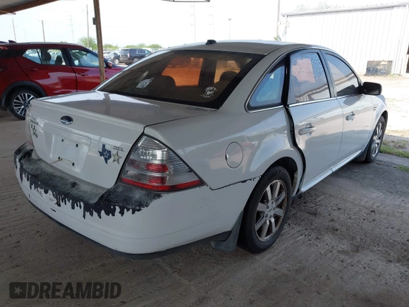 2008 Ford Taurus SEL z VIN 1FAHP24W68G143505, wystawiony jako IAAI lot #41932592 z przebiegiem 238 542 mil mil oraz . Historia ofert i sprzedaży dostępna na DreamBid. Obrazek 4.