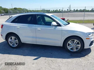 2017 Audi Q3 Premium with VIN WA1BCCFSXHR016914, listed as a IAAI auction lot 41784539 with 94,862 mi miles and . Bid and sale history available at DreamBid. Image 13.