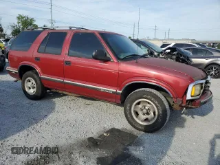1996 Chevrolet Blazer z VIN 1GNCS13W7T2150216, wystawiony jako Copart lot #54006685 z przebiegiem 1 518 487 mil mil oraz Szkoda całkowita • Salvage title. Historia ofert i sprzedaży dostępna na DreamBid. Obrazek 4.