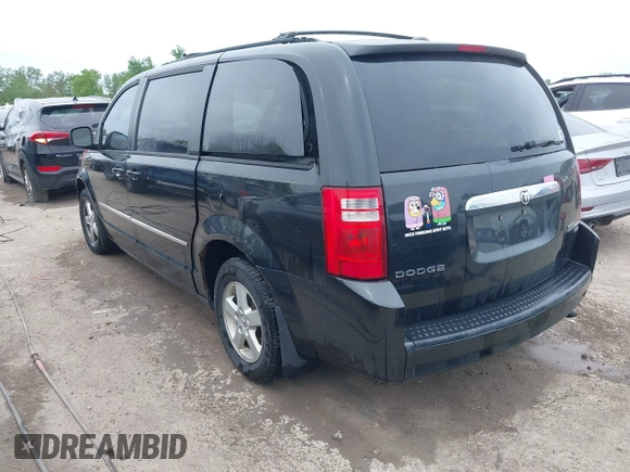 2010 Dodge Grand Caravan SXT z VIN 2D4RN5D12AR444953, wystawiony jako IAAI lot #42247277 z przebiegiem 214 387 mil mil oraz . Historia ofert i sprzedaży dostępna na DreamBid. Obrazek 3.