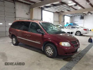 2001 Dodge Caravan Sport with VIN 2B4GP44351R247119, listed as a IAAI auction lot 41824983 with 157,156 mi miles and . Bid and sale history available at carsss.com. Image 1.