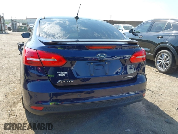 2017 Ford Focus Titanium with VIN 1FADP3J29HL204892, listed as a IAAI auction lot 42032705 with 119,028 mi miles and . Bid and sale history available at DreamBid. Image 17.