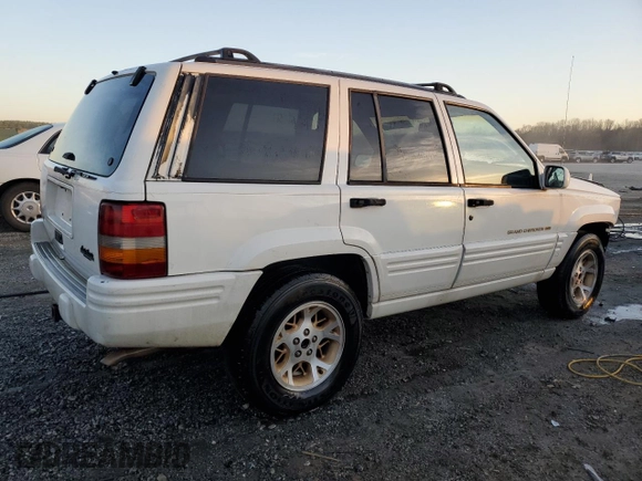 1996 Jeep Grand Cherokee z VIN 1J4FX78S6TC221815, wystawiony jako Copart lot #44000615 z przebiegiem 287 308 mil mil oraz Szkoda całkowita • Salvage title. Historia ofert i sprzedaży dostępna na DreamBid. Obrazek 3.