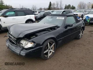 1997 Mercedes-Benz SL-Class with VIN WDBFA63F5VF145337, listed as a Copart auction lot 79991204 with 134,424 mi miles and Salvage Title. Bid and sale history available at carsss.com. Image 1.