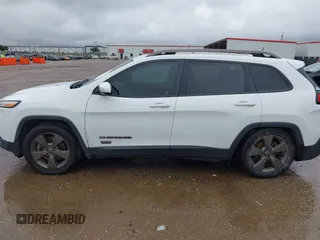 2017 Jeep Cherokee Latitude z VIN 1C4PJLCBXHW578514, wystawiony jako IAAI lot #42177673 z przebiegiem 125 030 mil mil oraz . Historia ofert i sprzedaży dostępna na DreamBid. Obrazek 14.