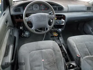 1996 Kia Sephia RS with VIN KNAFA125XT5263638, listed as a Copart auction lot 84226794 with 81,196 mi miles and Clean Title. Bid and sale history available at DreamBid. Image 8.
