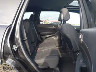 2014 Jeep Grand Cherokee Laredo with VIN 1C4RJFAG9EC516138, listed as a IAAI auction lot 42055214 with 135,701 mi miles. Bid and sale history available at carsss.com. Image 8.