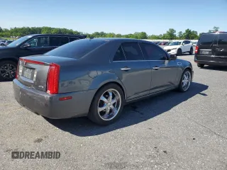 2008 Cadillac STS RWD z VIN 1G6DZ67A980172633, wystawiony jako Copart lot #59227065 z przebiegiem 186 288 mil mil oraz Szkoda całkowita • Salvage title. Historia ofert i sprzedaży dostępna na DreamBid. Obrazek 3.