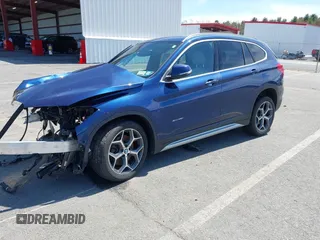 2017 BMW X1 xDrive28i with VIN WBXHT3C39H5F71525, listed as a IAAI auction lot 42050272 with 118,875 mi miles. Bid and sale history available at carsss.com. Image 16.