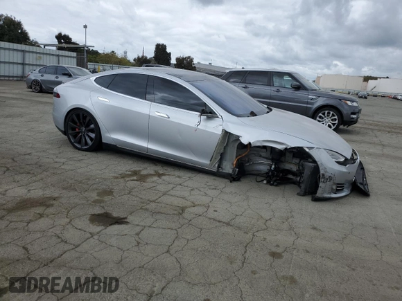 2014 Tesla Model S 60 z VIN 5YJSA1H11EFP43395, wystawiony jako Copart lot #54653845 z przebiegiem 120 180 mil mil oraz Szkoda całkowita • Salvage title. Historia ofert i sprzedaży dostępna na DreamBid. Obrazek 4.