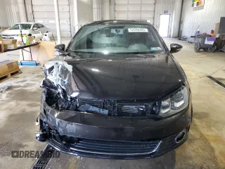 2014 Volkswagen Eos Komfort with VIN WVWBW8AH8EV000316, listed as a Copart auction lot 52208485 with 124,338 mi miles and Salvage Title. Bid and sale history available at DreamBid. Image 5.