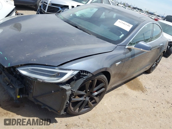 2018 Tesla Model S 75D with VIN 5YJSA1E43JF260547, listed as a IAAI auction lot 42346240 with 89,637 mi miles and . Bid and sale history available at DreamBid. Image 2.