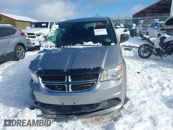 2017 Dodge Grand Caravan SE Plus z VIN 2C4RDGBG7HR789747, wystawiony jako IAAI lot #41289595 z przebiegiem 89 577 mil mil oraz . Historia ofert i sprzedaży dostępna na DreamBid. Obrazek 13.