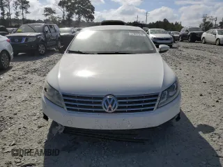 2013 Volkswagen CC Sport with VIN WVWBP7ANXDE565694, listed as a Copart auction lot 77947514 with 180,160 mi miles and Salvage Title. Bid and sale history available at carsss.com. Image 5.