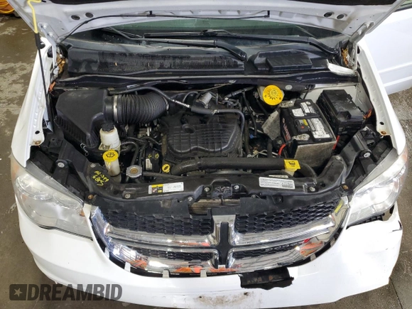 2014 Dodge Grand Caravan SXT with VIN 2C4RDGCG6ER427435, listed as a Copart auction lot 51957355 with 106,078 mi miles and Salvage Title. Bid and sale history available at DreamBid. Image 13.