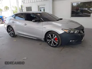2018 Nissan Maxima SL z VIN 1N4AA6AP2JC385180, wystawiony jako IAAI lot #42340264 z przebiegiem 115 736 mil mil oraz . Historia ofert i sprzedaży dostępna na DreamBid. Obrazek 1.