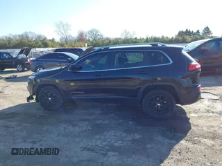 2016 Jeep Cherokee 75th Anniversary with VIN 1C4PJLCB5GW107918, listed as a IAAI auction lot 41923377 with 165,619 mi miles and . Bid and sale history available at DreamBid. Image 14.