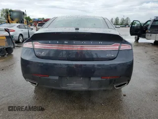 2013 Lincoln MKZ с VIN 3LN6L2G95DR828256, выставлен на аукционе Copart как лот 55645125 с пробегом 44 519 миль миль и Списание • Salvage title. История ставок и продаж доступна на DreamBid. Изображение 6.