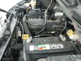 2013 Dodge Grand Caravan SE with VIN 2C4RDGBG4DR662089, listed as a IAAI auction lot 43182649 with 125,080 mi miles and . Bid and sale history available at DreamBid. Image 12.