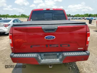 2019 Ford F-150 XL with VIN 1FTEW1EPXKFB27337, listed as a Copart auction lot 57979195 with 103,435 mi miles and Salvage title. Bid and sale history available at DreamBid. Image 6.