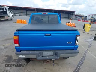 1999 Ford Ranger XLT z VIN 1FTZR15X5XTA79599, wystawiony jako IAAI lot #42109669 z przebiegiem 184 836 mil mil oraz . Historia ofert i sprzedaży dostępna na DreamBid. Obrazek 16.