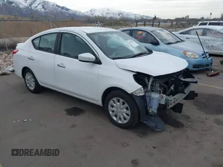2016 Nissan Versa S with VIN 3N1CN7APXGL808164, listed as a IAAI auction lot 41815979 with 169,000 mi miles. Bid and sale history available at carsss.com. Image 1.