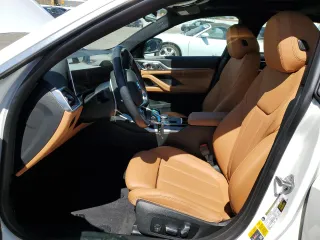 2023 BMW i4 eDrive40 z VIN WBY73AW05PFN75140, wystawiony jako Copart lot #51791515 z przebiegiem 28 426 mil mil oraz Szkody całkowita. Historia ofert i sprzedaży dostępna na DreamBid. Obrazek 7.