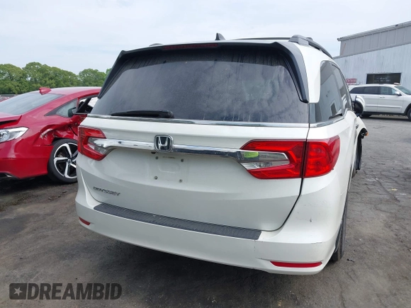 2018 Honda Odyssey EX-L with VIN 5FNRL6H77JB047919, listed as a IAAI auction lot 42112505 with 108,706 mi miles and . Bid and sale history available at DreamBid. Image 16.