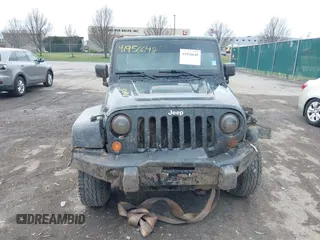 2012 Jeep Wrangler Unlimited Call of Duty MW3 z VIN 1C4BJWFG0CL202238, wystawiony jako IAAI lot #41956648 z przebiegiem 92 572 mil mil oraz . Historia ofert i sprzedaży dostępna na DreamBid. Obrazek 12.