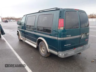 1997 GMC Savana with VIN 1GDFG15R6V1004277, listed as a IAAI auction lot 41462401 with 495,223 mi miles. Bid and sale history available at carsss.com. Image 3.