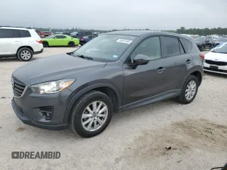 2016 Mazda CX-5 Touring z VIN JM3KE2CYXG0725517, wystawiony jako Copart lot #50607485 z przebiegiem 126 831 mil mil oraz Czysty tytuł • Clean title. Historia ofert i sprzedaży dostępna na DreamBid. Obrazek 1.