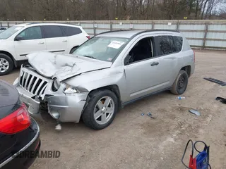2007 Jeep Compass Sport with VIN 1J8FT47W57D397445, listed as a IAAI auction lot 41699966 with 235,960 mi miles. Bid and sale history available at carsss.com. Image 2.