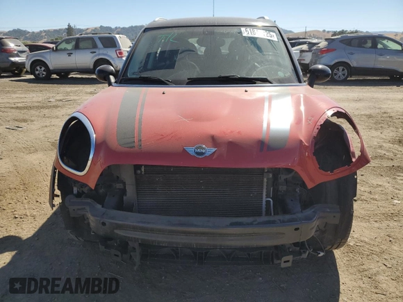 2014 MINI Countryman with VIN WMWZB3C5XEWR42035, listed as a Copart auction lot 61846725 with 105,131 mi miles and Salvage title. Bid and sale history available at DreamBid. Image 5.