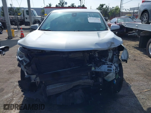 2021 Chevrolet Equinox LT z VIN 2GNAXKEV8M6103073, wystawiony jako IAAI lot #42111470 z przebiegiem 107 700 mil mil oraz . Historia ofert i sprzedaży dostępna na DreamBid. Obrazek 6.