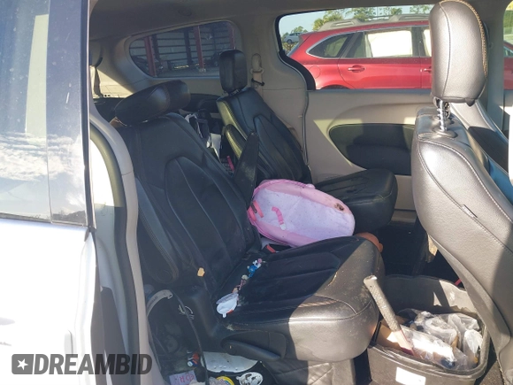 2017 Chrysler Pacifica Touring L with VIN 2C4RC1BG2HR526503, listed as a IAAI auction lot 40264571 with 136,262 mi miles and . Bid and sale history available at DreamBid. Image 8.