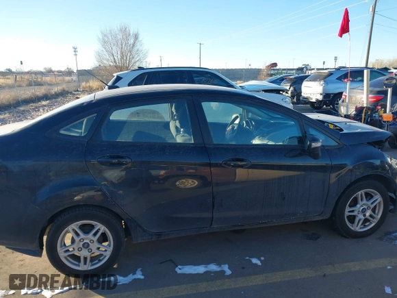 2017 Ford Fiesta SE z VIN 3FADP4BJ6HM125903, wystawiony jako IAAI lot #41376018 z przebiegiem 114 628 mil mil oraz . Historia ofert i sprzedaży dostępna na DreamBid. Obrazek 13.