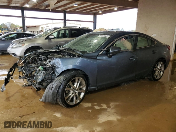 2014 Mazda 6 i Grand Touring с VIN JM1GJ1W53E1104181, выставлен на аукционе Copart как лот 51261045 с пробегом 289 302 миль миль и Списание • Salvage title. История ставок и продаж доступна на DreamBid. Изображение 1.