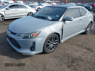 2014 Scion tC z VIN JTKJF5C71E3081033, wystawiony jako IAAI lot #41928949 z przebiegiem 144 112 mil mil oraz . Historia ofert i sprzedaży dostępna na DreamBid. Obrazek 6.