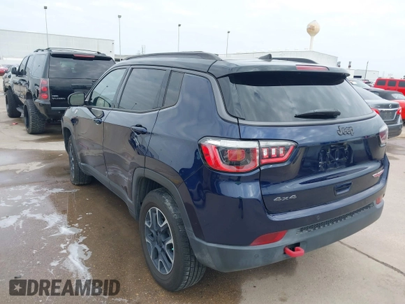 2019 Jeep Compass Trailhawk with VIN 3C4NJDDB8KT619330, listed as a IAAI auction lot 41237920 with 85,144 mi miles and . Bid and sale history available at DreamBid. Image 3.