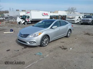 2013 Hyundai Azera with VIN KMHFH4JG9DA323254, listed as a IAAI auction lot 41776183 with 73,489 mi miles and . Bid and sale history available at DreamBid. Image 2.