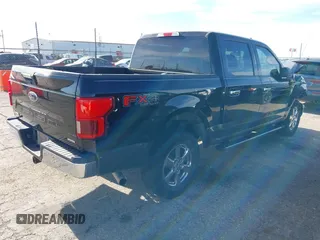 2020 Ford F-150 XL with VIN 1FTEW1E41LFA14450, listed as a IAAI auction lot 42148087 with 184,168 mi miles and . Bid and sale history available at DreamBid. Image 4.